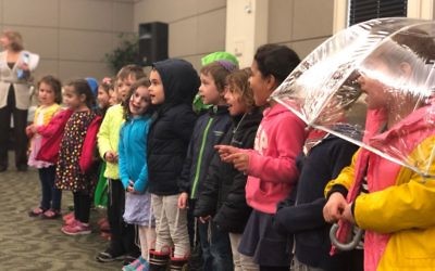Beth Jacob pre-kindergartners sing for Holocaust survivors at Camp Europa on March 26.