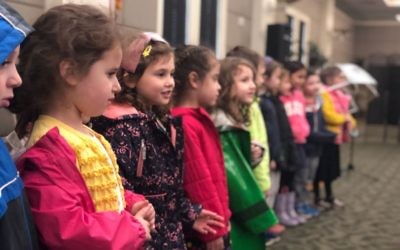 Beth Jacob pre-kindergartners sing for Holocaust survivors at Camp Europa on March 26.