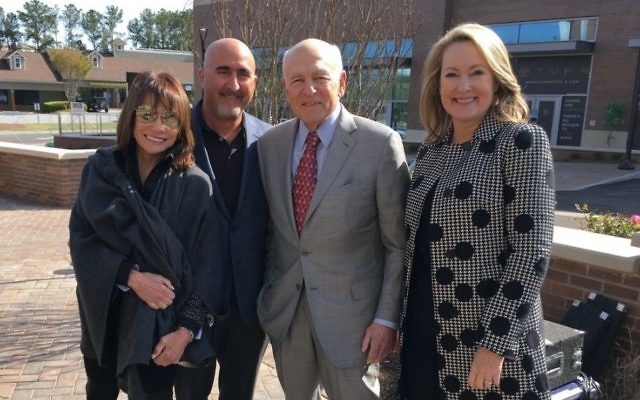 Nearing the end of a three-year build, developers Jerome Hagley (second from left) with Carter and Selig Cathy Selig, Steve Selig and Jo Ann Chitty with Selig Enterprises attend the announcement of the first retail tenants at City Springs on April 11. (Photo by Leah R. Harrison)