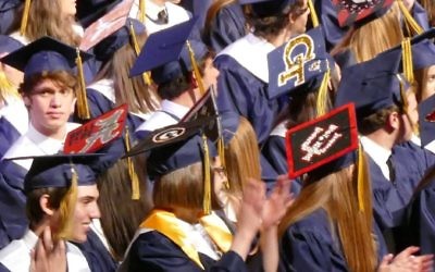 Some Weber grads wear their college plans on their mortarboards.