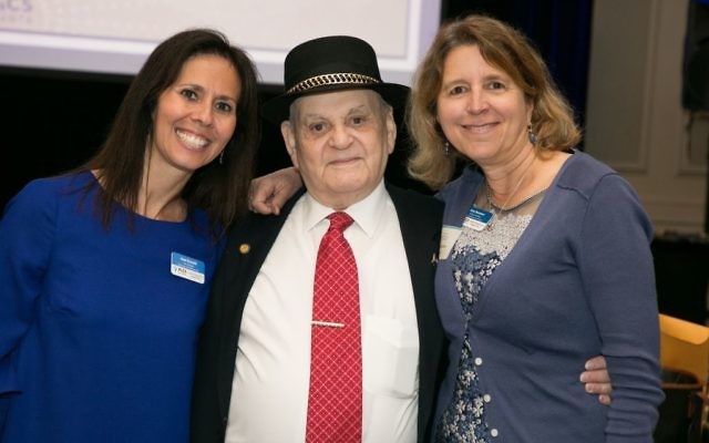 Clinicians Anat Granath (left) and Amy Neuman escort Holocaust survivor Leon Asner, who shared his journey with JF&CS.