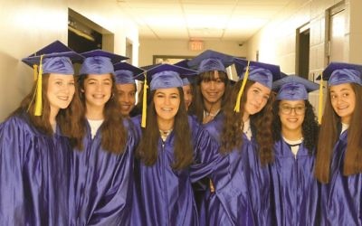 Graduates from the Torah Day School of Atlanta prepare for their graduation ceremony on June 11 at Congregation Beth Jacob.