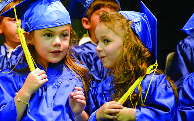 Two of the 38 kindergarten students that graduated from the Torah Day School of Atlanta on Tuesday, June 12. Many will continue their studies at the school.