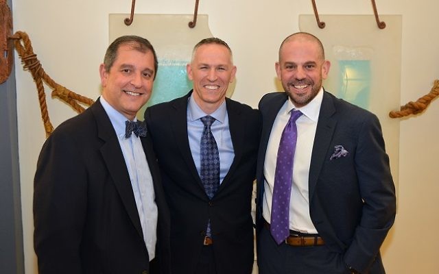 The Marcus JCC’s new board chair, Ken Winkler, is flanked by his predecessor, Joel Arogeti (left), and CEO Jared Powers. (Photo by Jennifer Sami)