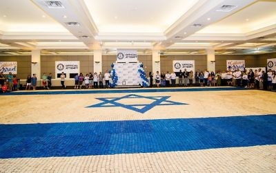 At 3,224 square feet, Jewish Atlanta’s Israeli cookie mosaic flag is 786 square feet larger than the previous recordholder, a Pakistani cookie flag from 2017. (Photo by Eli Gray)