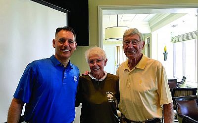Glen Golish, board chairman of Helping Israel Fund, Inc., (left) poses with corporate sponsors, Billi and Bernie Marcus.