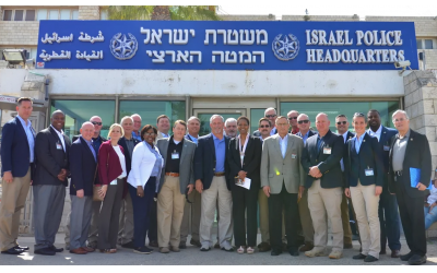 The Southeast delegation pose in front of the Israel Police Headquarters