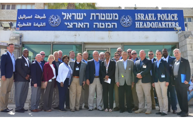 The Southeast delegation pose in front of the Israel Police Headquarters