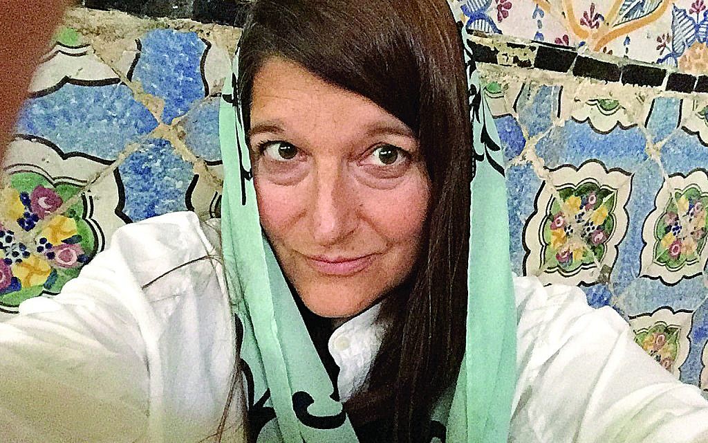 Carrie Rosefsky Wickham wears a headscarf, when appropriate, in Muslim countries.