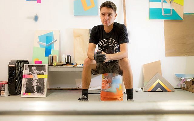 Artist Adam Podber is surrounded by works in progress at his studio at MET Atlanta on the West End.