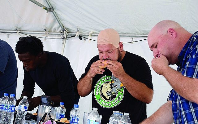 Professional eater Brandon Clark won the Bagel Eating Contest with seven bagels in five minutes.