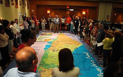 With Ken Stein's help, educators get a feel for Israel's geography at the 2011 summer workshop.