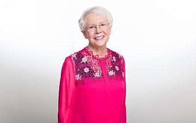 As a survivor herself, Billi wears pink for October Breast Cancer Awareness Month.