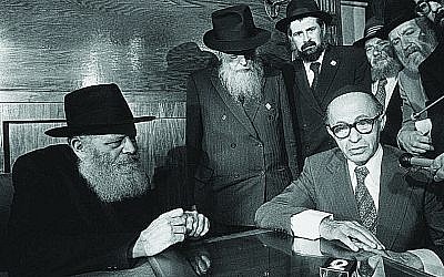 Photo by Yaacov Saar/GPO // Lubavitcher Rebbe, Rabbi Menachem Mendel Schneerson, seventh leader in the Chabad-Lubavitch dynasty, with Israeli Prime Minister Menachem Begin (right) in Brooklyn, N.Y.