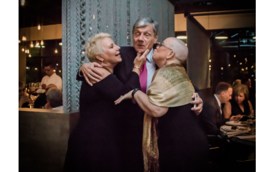 Founder and CEO of the Ovarian Cancer Institute, Dr. Benedict Benigno (center) is surrounded by cancer survivors Georgette Robertson and Ann Pinyan.