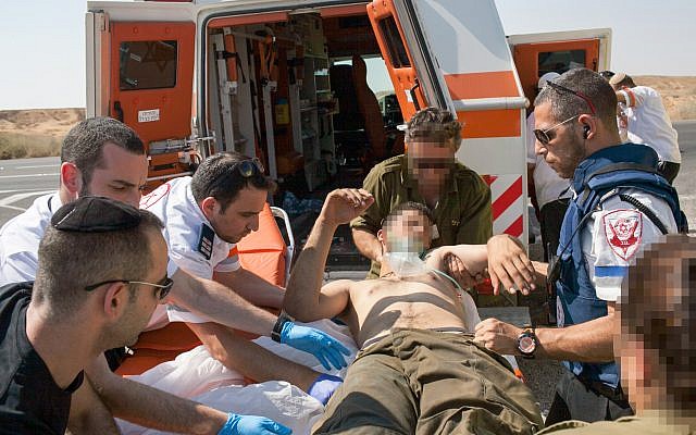An IDF soldier receives blood.