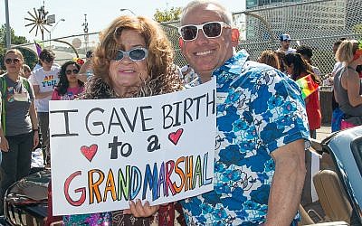 Rabbi Joshua Lesser, a parade grand marshal, poses with his supportive mom, Alayne Lesser.