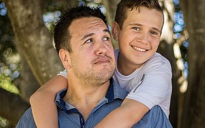 How frequent is the communication between father and son about physical body changes during puberty?
