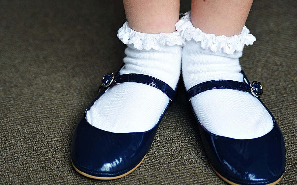 The author recalls wearing Mary Janes to synagogue.