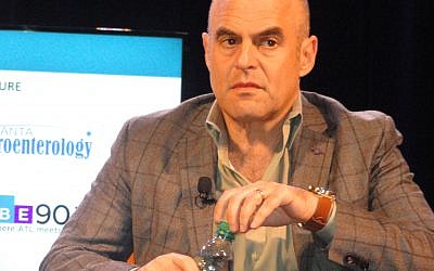 NPR’s Peter Sagal discussed his book, "The Incomplete Book of Running," about his life as a runner.