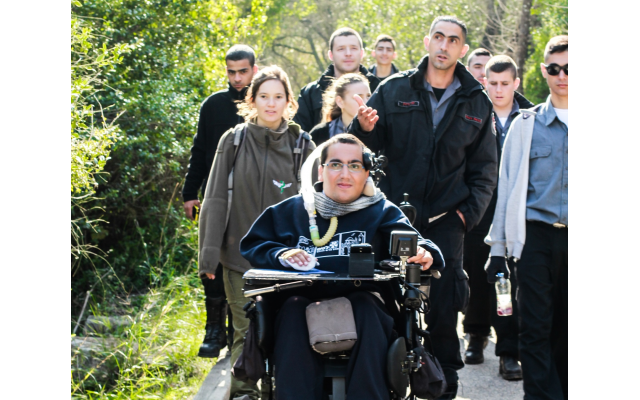 Israeli firefighters get a tour of a trail in LOTEM to understand how the parks have become more inclusive of people with disabilities.