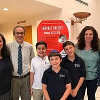 Lynn and Brian Gordon, Bobbi Livnat and Diane Bland, as well as children who delivered words of Torah at the Shabbat Project.