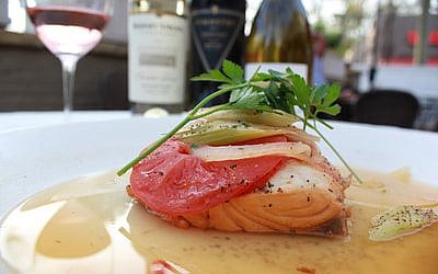 Nowak's New Orleans origins are showcased with white wine sauce, celery, tomatoes and onions on the American Gulf redfish.