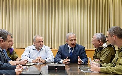 Photo by Government Press Office/Amos Ben-Gershom // Prime Minister Benjamin Netanyahu holds a security briefing in Tel Aviv.