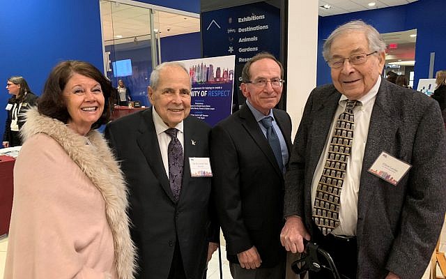 Elliott Levitas is pictured at an Anti-Defamation League eception with Sandra Gordy Massell, Sam Massell and Bobby Goldstein.