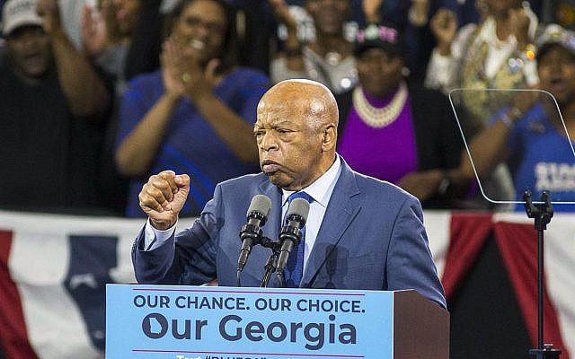 Congressman John Lewis, one of the last surviving members of Martin Luther King’s inner circle, speaks at Abrams' rally.