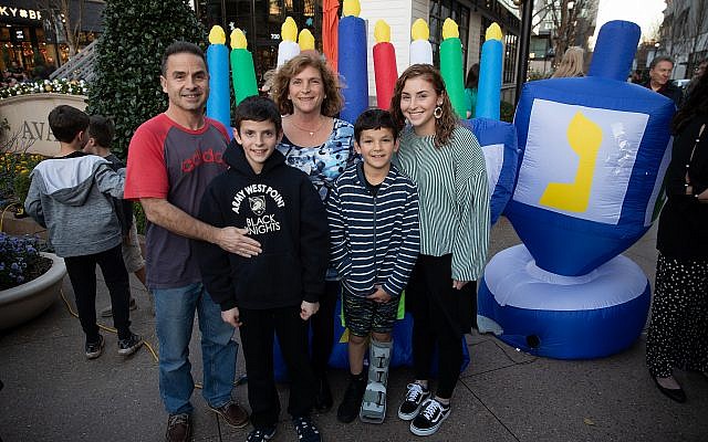 Friends and families of all ages gathered to enjoy holiday-inspired refreshments, exclusive giveaways and musical entertainment for this year’s menorah lighting at Avalon.
