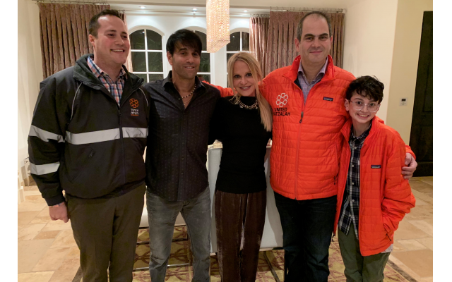 Gavriel Friedson, deputy director of international operations of United Hatzalah, hosts Jeff and Carrla Goldstein, Eli Beer, United Hatzalah president and founder, and Gabe Jack Stein, who raised $65,000 for UH for his bar mitzvah project.