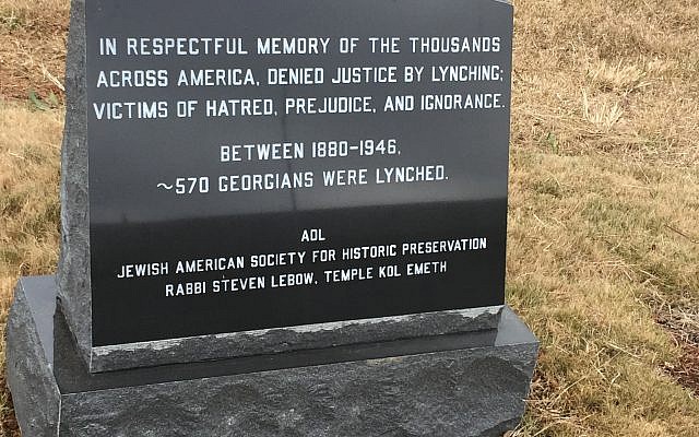 The new Georgia lynching memorial sits a few feet from the plaque memorializing Leo Frank's lynching in August 1915.
