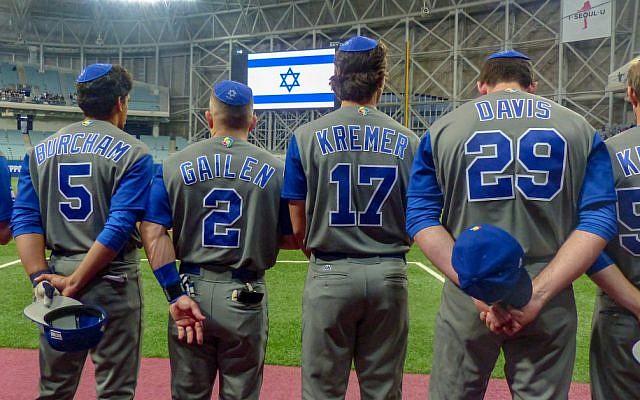 Team Israel sports kippot under baseball caps.