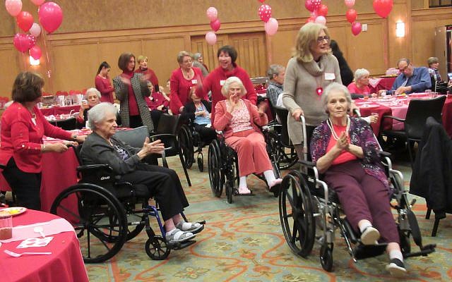 The William Breman Jewish Home Auxiliary’s annual Sweetheart’s Ball got residents dancing in their chairs spirited by Auxiliary volunteers.