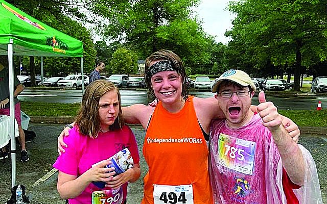 Caroline and Todd with Abby Frantz (center) at the Adult Disability Medical Home 5k.