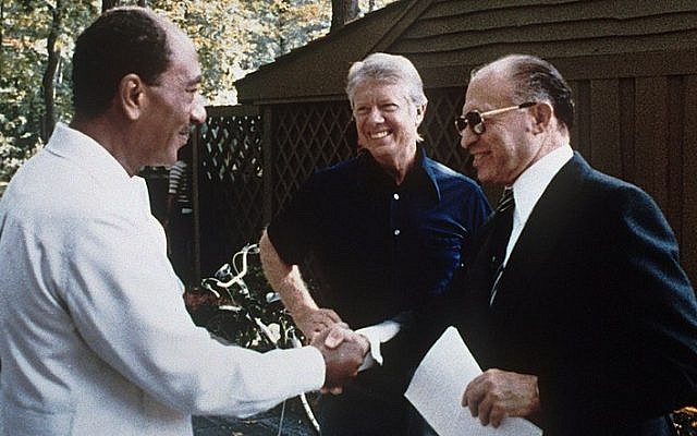 Israeli Prime Minister Menachem Begin, right, Egyptian President Anwar Sadat, left, and President Jimmy Carter at Camp David in September 1978.