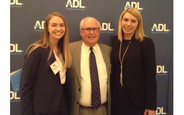 Bennet Alsher, ADL board member and Ford Harrison attorney, with Courtney Majors, left, and Chelsey Lewis, right.
