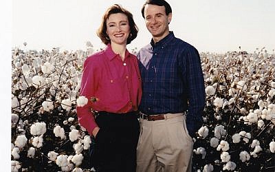 Deborah and Lou Jacobs in a cotton field in Cary, Miss.