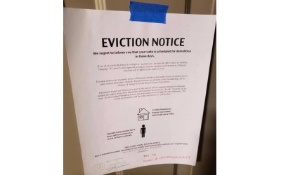 Mock eviction notice posted on Emory students’ dorm room doors.