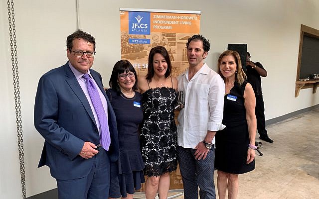 New JF&CS CEO Terri Bonoff, second from left, with her husband Matthew Knopf, far left, pose with Amy Fingerhut, event restaurant chair, her husband Kevin Blate and Robin Feldman, JF&CS vice president of resource development.