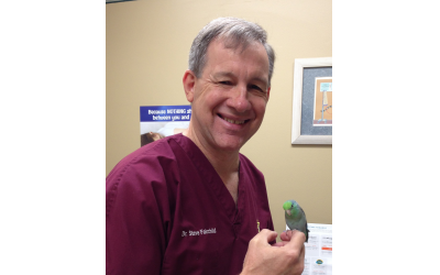 A parrotlet named Ocean is among Dr. Steve Fairchild’s patients.