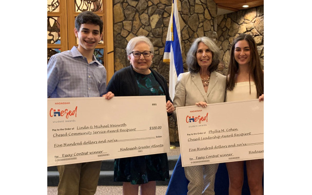 Student essay award winners with their donors were: Grant Chernau, Linda Weinroth, Phyllis M. Cohen and Jereme Weiner.
