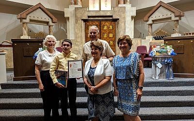 RuthE Levy, sponsor, judge, and owner of And Thou Shalt Read bookstore; Jackson Weatherill, second place winner; Vic Anapolle, Enlighten America chair; Helen Scherrer-Diamond and Lee Tanenbaum, B’nai B’rith co-presidents.