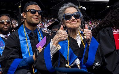 Photo by Meg Buscema // GSU graduate Joyce Lowenstein gives a thumbs-up about her recent achievement.