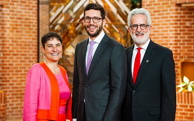 Micah Weiss at his graduation with Rabbi Deborah Waxman, Ph.D., president of Reconstructing Judaism, and Seth Rosen, chair of Reconstructing Judaism’s Board of Governors.