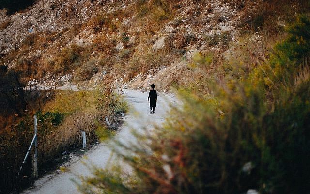 “Man Walking Along a Path” is another example of Schusterman-Lapidus’ reflective pieces.