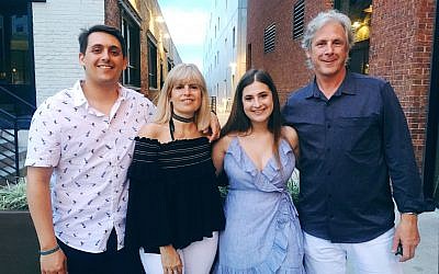 Chloe (second from right) enjoys spending time with her family: Graham, Robyn Rousso, and Tony Levitas.