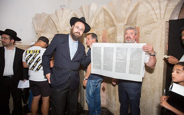 Rabbi Ephraim Silverman, left, with Eyal Postelnik.