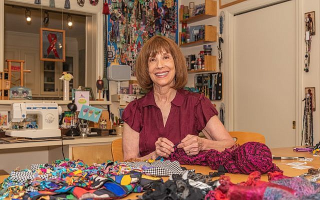 Lynn joyfully creates in her home workshop Judaica, belts and scarves.